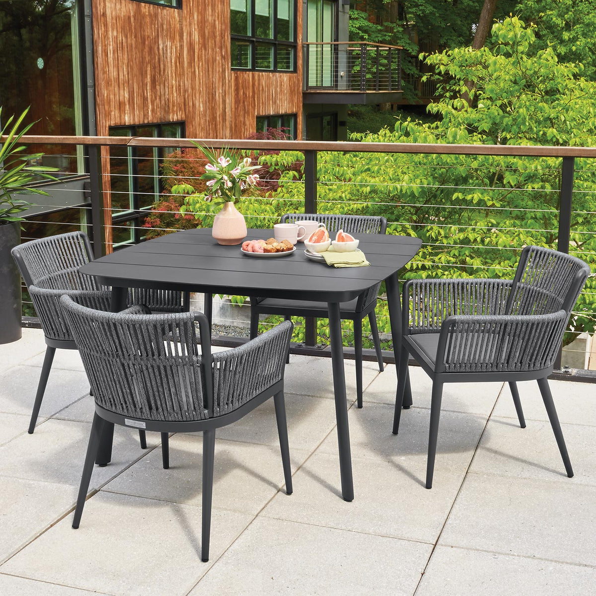 Oxford Garden Nette 5-Piece Square 45 inch Dining Set shown set up in an outdoor setting