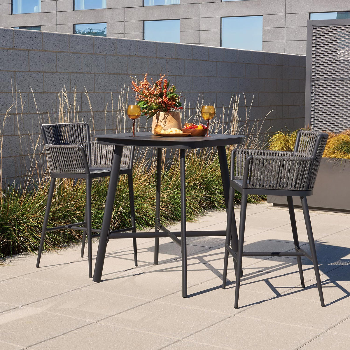 Oxford Garden Nette 3-Piece Square 36 inch Bar Set shown set up in an outdoor setting