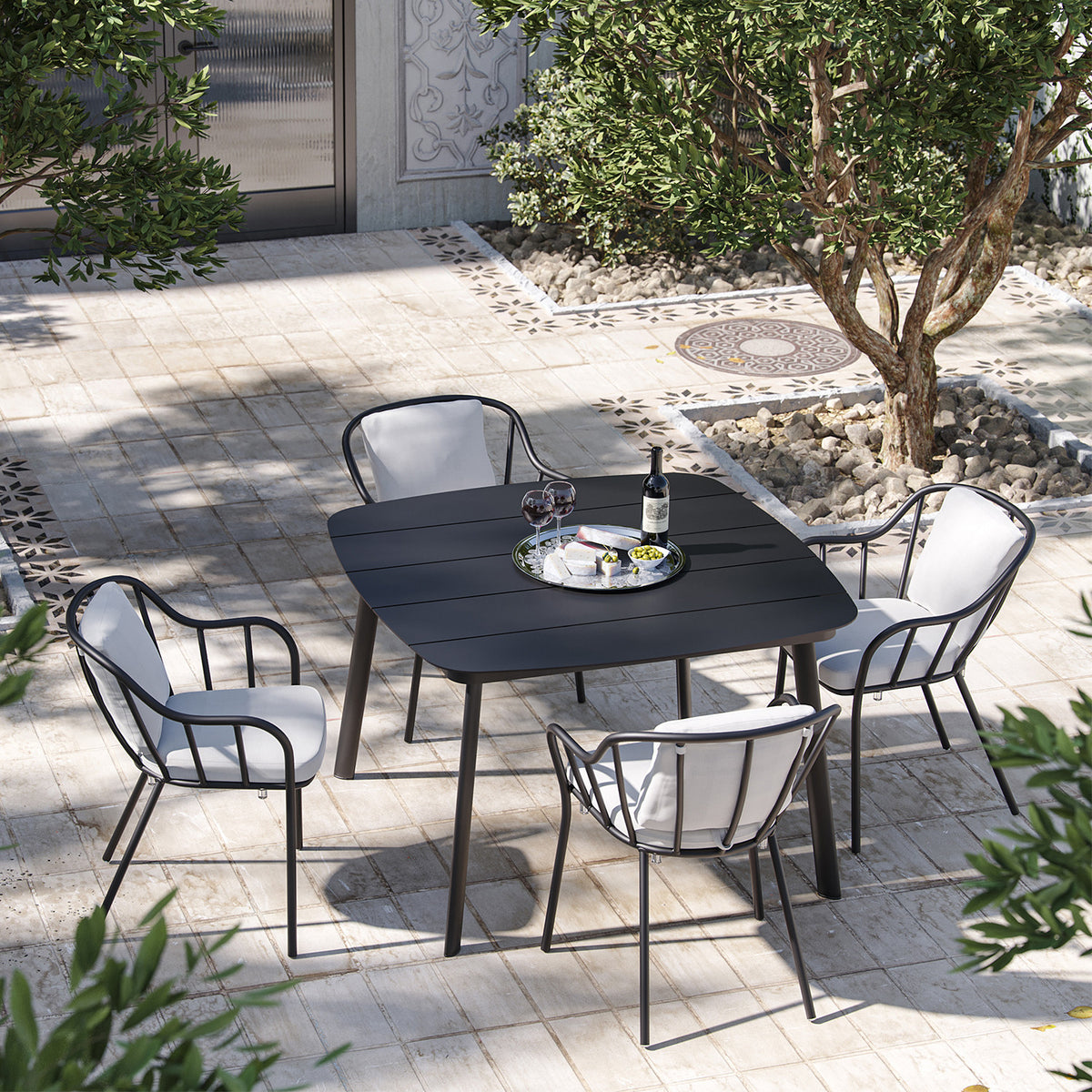 Oxford Garden Malti 5-Piece Square 45 inch Dining Set shown set up in an outdoor setting