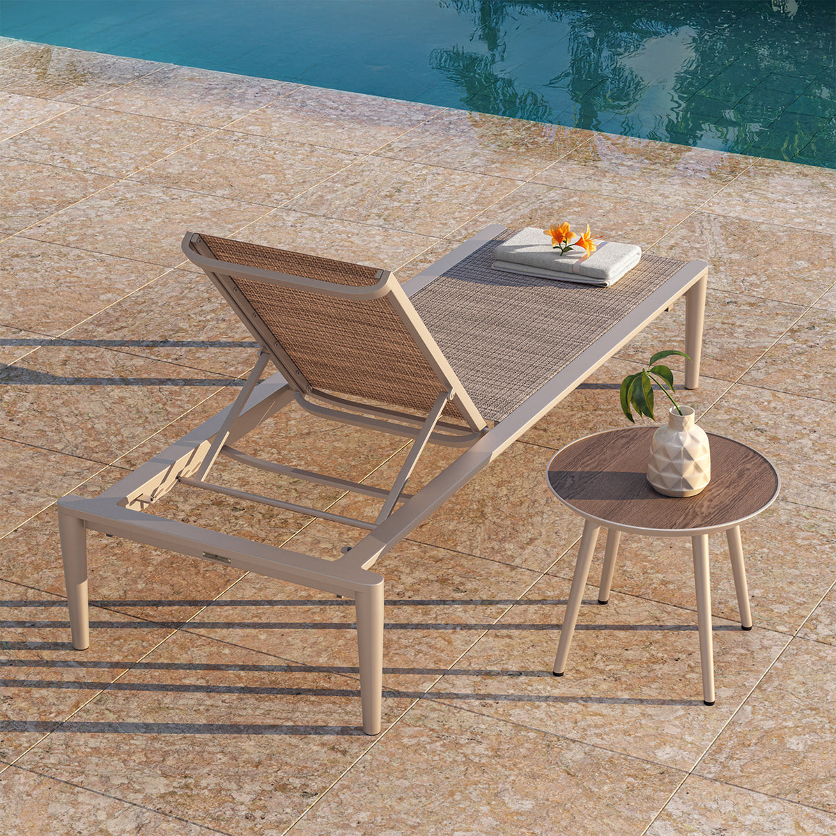 Detail of the sling and aluminum frame on the Costille chaise lounge