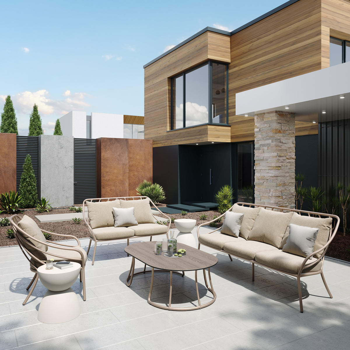 Seavo deep seating group with Sunbrella cushions arranged around a low table on a residential patio