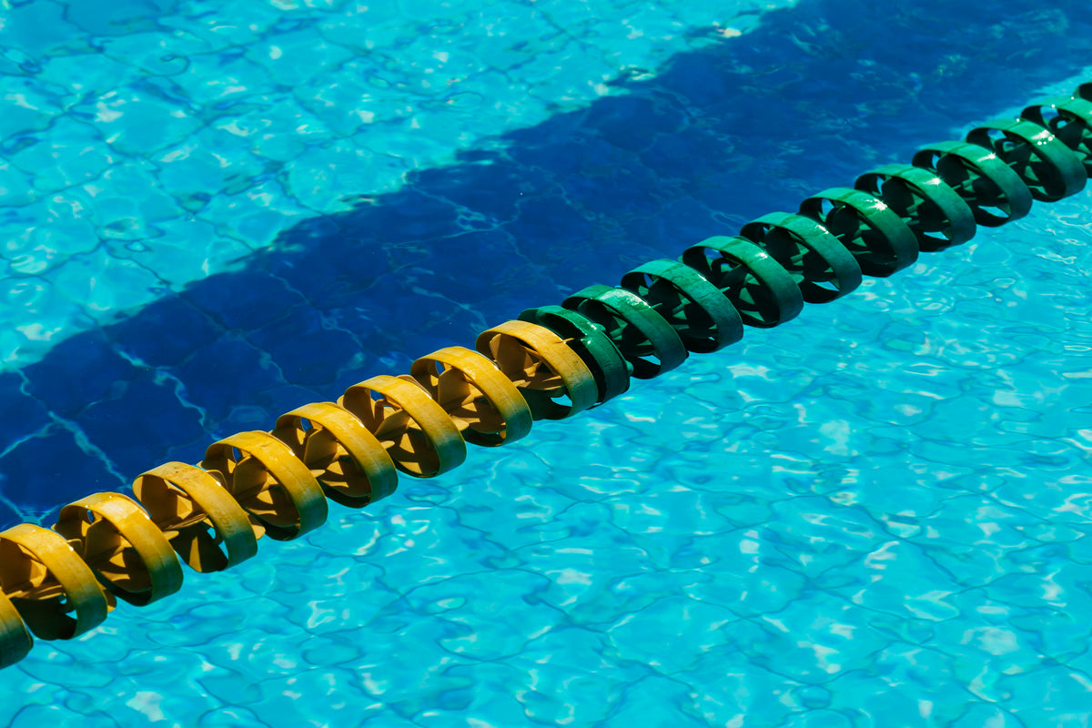 Lane line floats on the surface of a swimming pool
