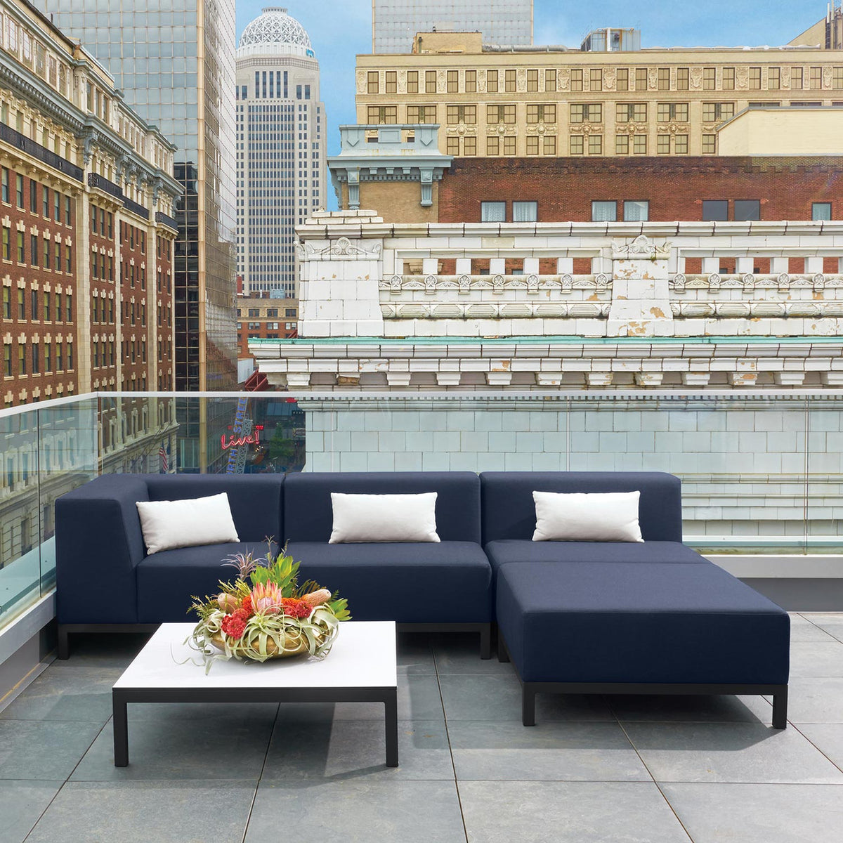 Oxford Garden Koral Modular Corner Seat Upholstery shown in an outdoor setting