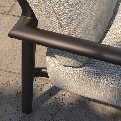 Close view of the seat and back cushion meeting at the back of an Eiland cushioned club chair