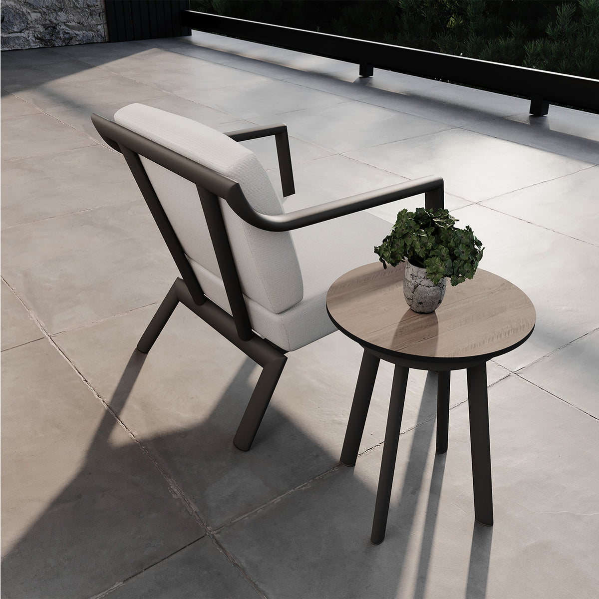 Oxford Garden Markoe Club Chair shown in an outdoor setting