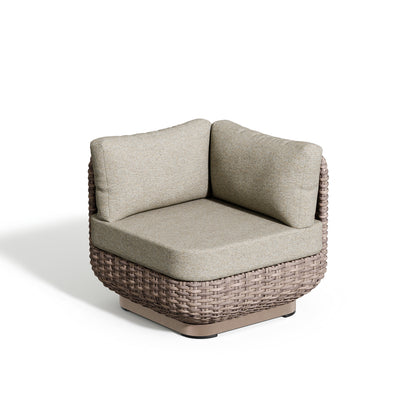 Nomi corner seat module with its square seat cushion and wrapping back bolster in Mainstreet Dove