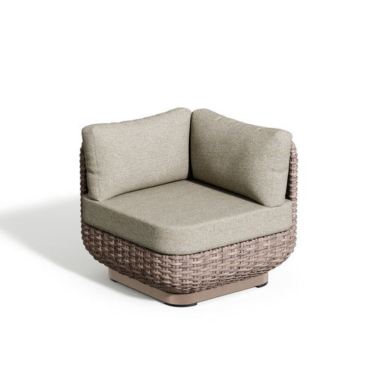 Nomi corner seat module with its square seat cushion and wrapping back bolster in Mainstreet Dove
