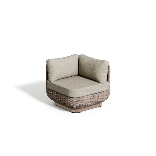 Oxford Garden Nomi Resin Wicker Corner Seat shown on a plain white background