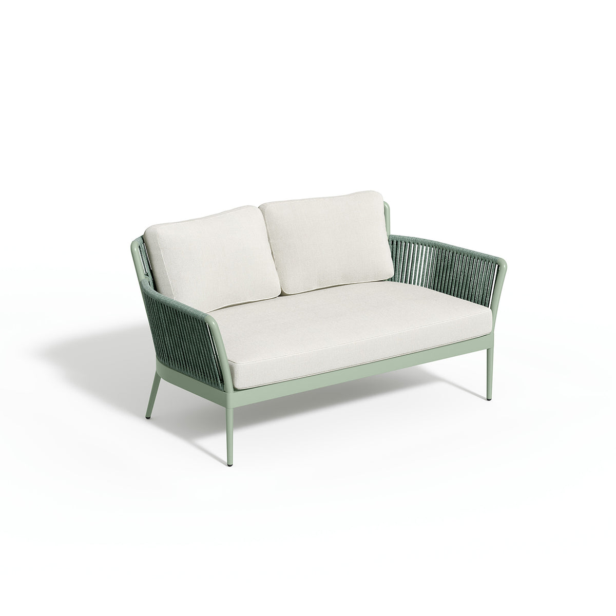 Nette loveseat carrying Bliss Linen cushions on a sage frame, photographed on white