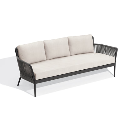 Nette sofa dressed in Bliss Linen cushions on a carbon frame, on a white background