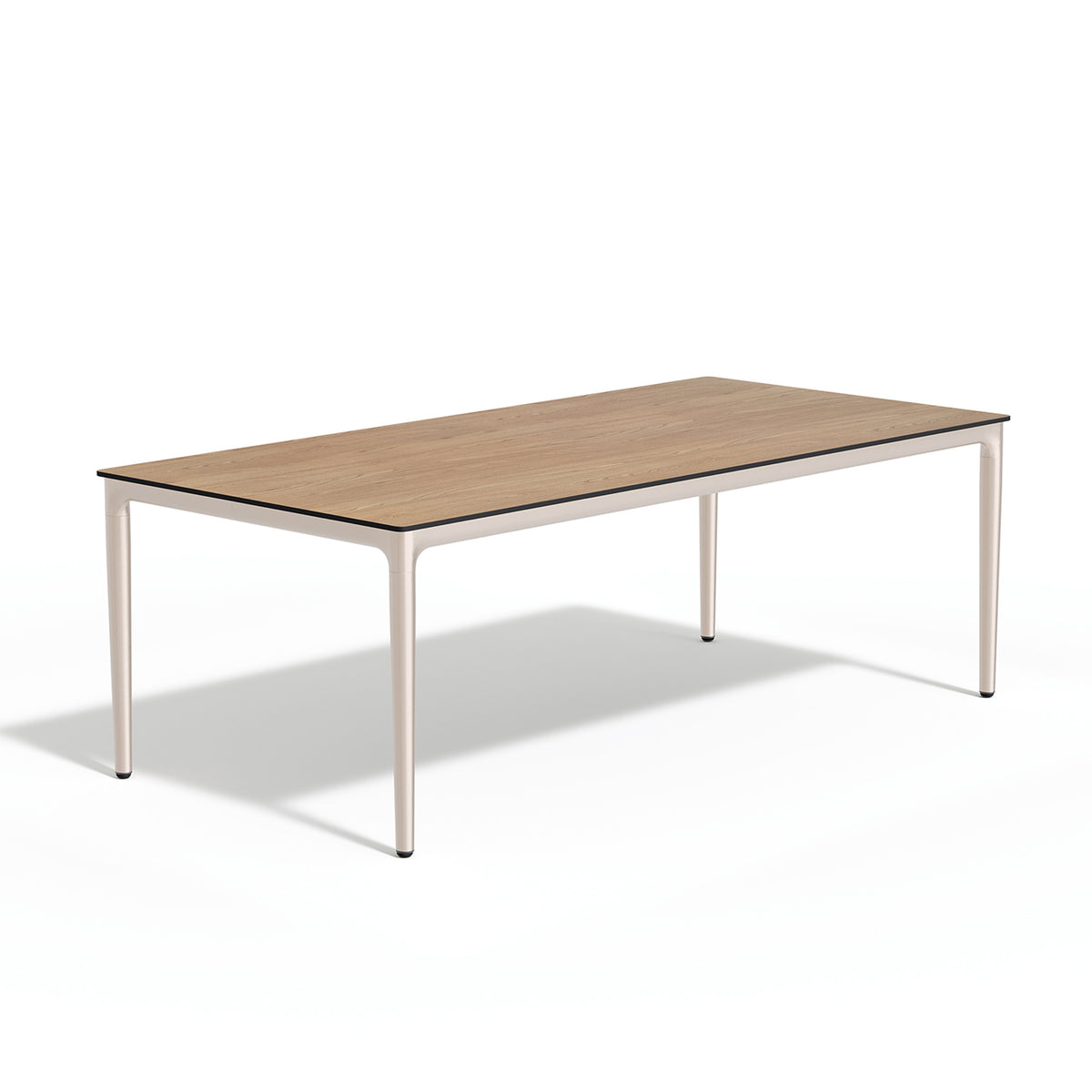 The same long dining table with a dark laminate top and a pale frame, on a plain white background