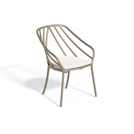 Seavo armchair with a Bliss Linen seat pad on a satin powder coated frame, on white