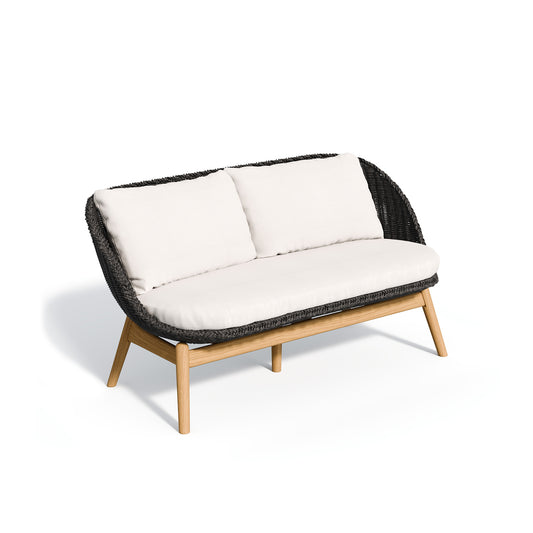 Two seat woven loveseat in the Shadow weave with Bliss Linen cushions, on a plain white background