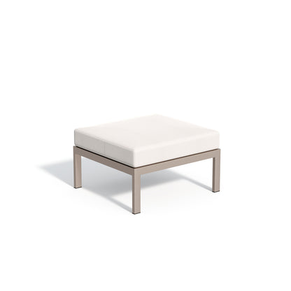 Travira ottoman with a Bliss Linen pad on a taupe powder coated frame, on white