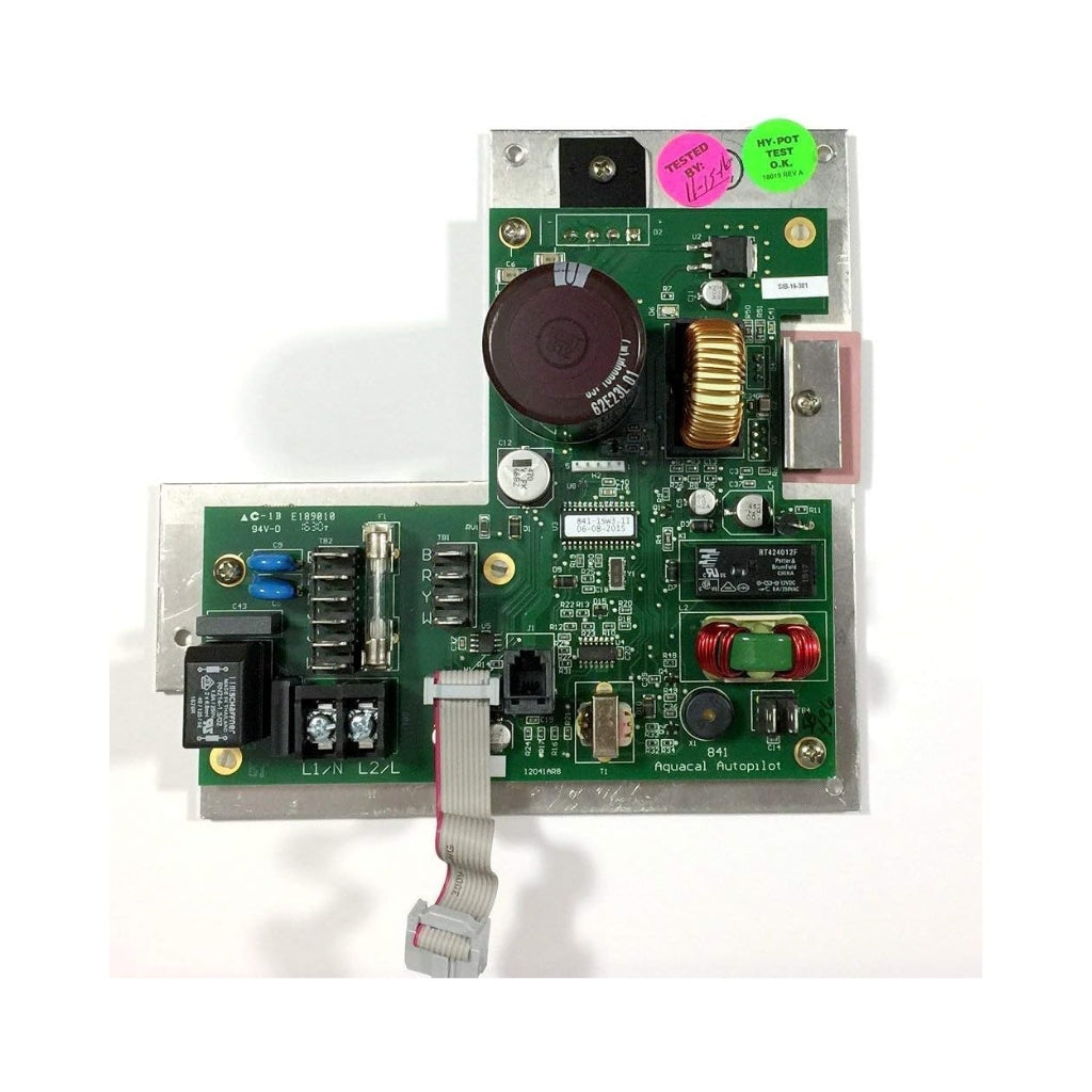 AquaCal AutoPilot control board with power module, showing electronic components, relays, transformer coil, and ribbon cable for pool and spa equipment control