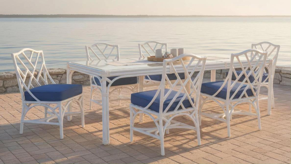 David Francis outdoor dining set on a waterfront patio