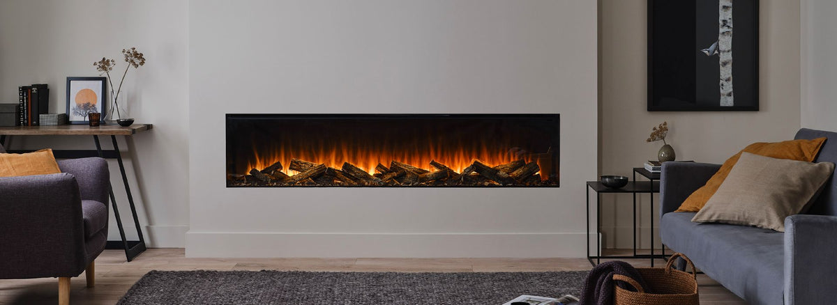 British Fires New Forest Black Edition electric fireplace built into a wall, flames lit