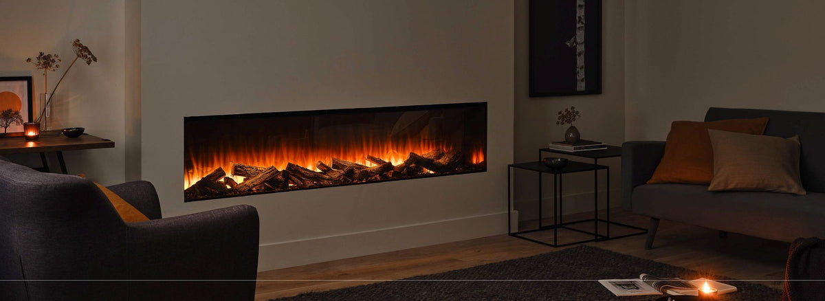 British Fires New Forest Black Edition linear electric fireplace with LED flames over a real oak log bed