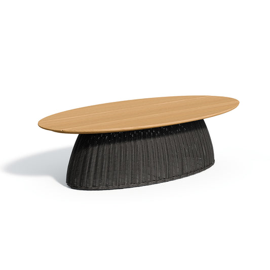 Long rectangular teak topped coffee table on a dark woven base, on a plain white background