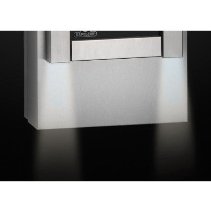 Napoleon LK8 LED light accessory installed at the base of a modern Napoleon gas fireplace