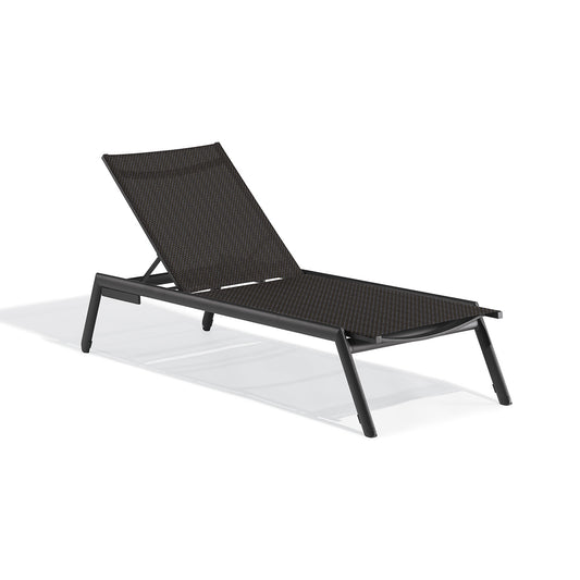 Oxford Garden Eiland armless outdoor chaise lounge with a tensioned composite sling deck in Ninja on a carbon powder coated aluminum frame, shown on a plain white background