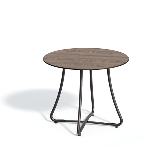 36 inch round folding outdoor dining table with a Marshland Oak laminate top