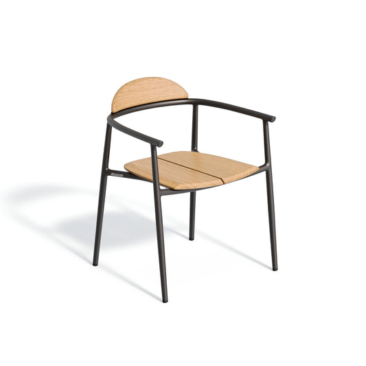 Low backed dining armchair with a teak seat on a Carbon powder coated aluminum frame, shown against a plain background