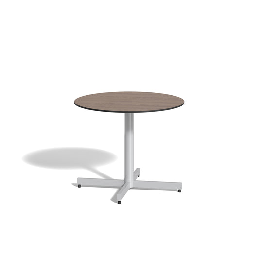 Mena 36 inch round bistro table with an HPL Marshland Oak top on a Flint powder coated woven column, on a plain white background