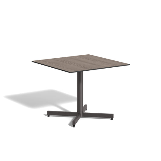 Mena 36 inch square bistro table with an HPL Marshland Oak top on a Carbon powder coated woven column, on a plain white background