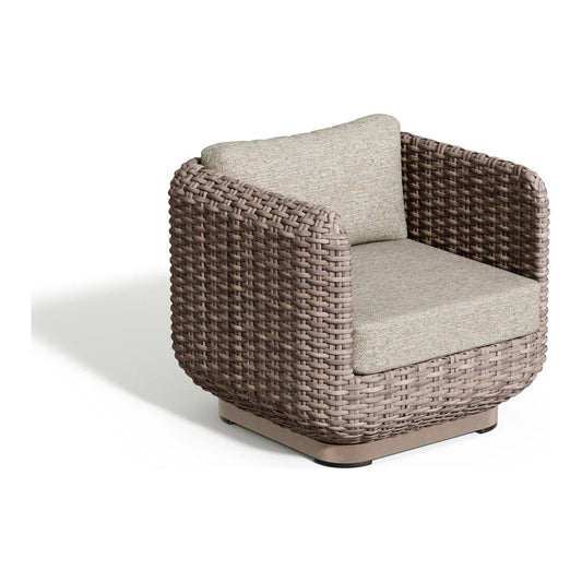 Deep seating club chair in greige resin wicker with a thick cream seat cushion and matching back cushion on a taupe aluminum base