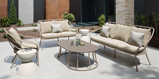 Seavo lounge seating with Sunbrella cushions arranged on an outdoor terrace