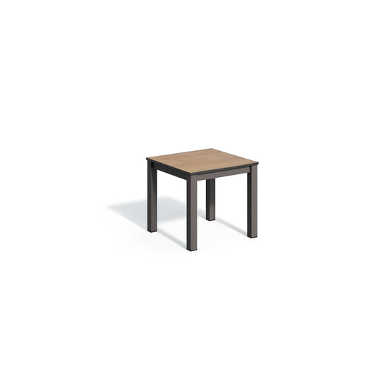 Oxford Garden Travira 18 inch square outdoor end table with a high pressure laminate top on a carbon black powder coated aluminum frame, shown on a plain white background