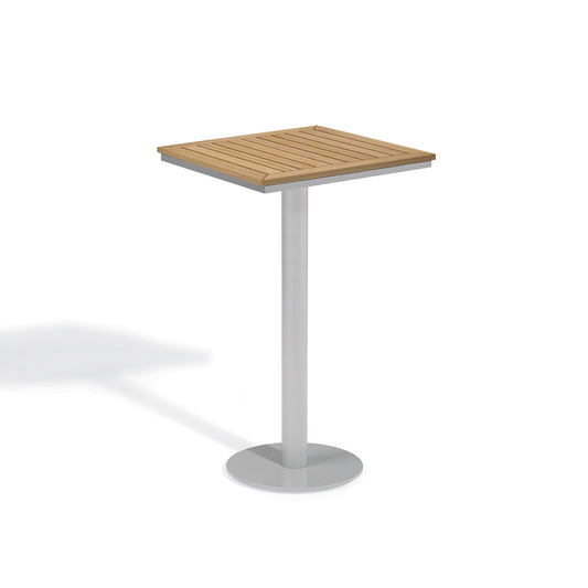 Oxford Garden Travira 26 inch square bar height outdoor table with a natural wood grain Tekwood top on a flint grey powder coated aluminum pedestal base, shown on a plain white background