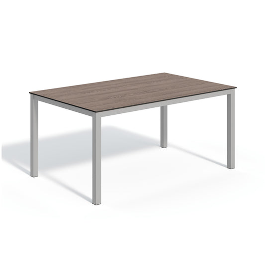 Oxford Garden Travira 63 inch rectangular outdoor dining table with a high pressure laminate top on a flint grey powder coated aluminum frame, shown on a plain white background