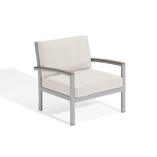 Travira cushioned lounge chair with Bliss Linen cushions, Tekwood Vintage arm caps and a flint powder coated aluminum frame