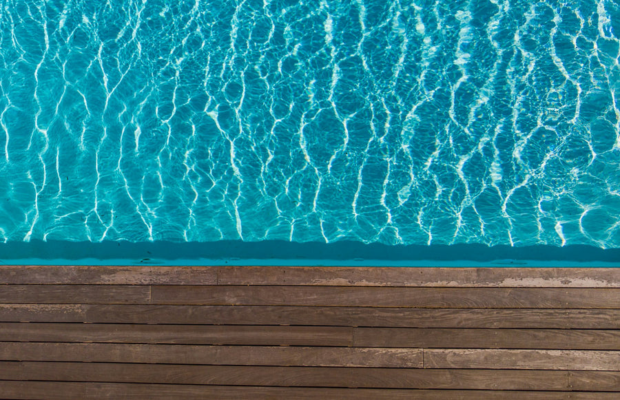 Swimming pool with a deck in daylight