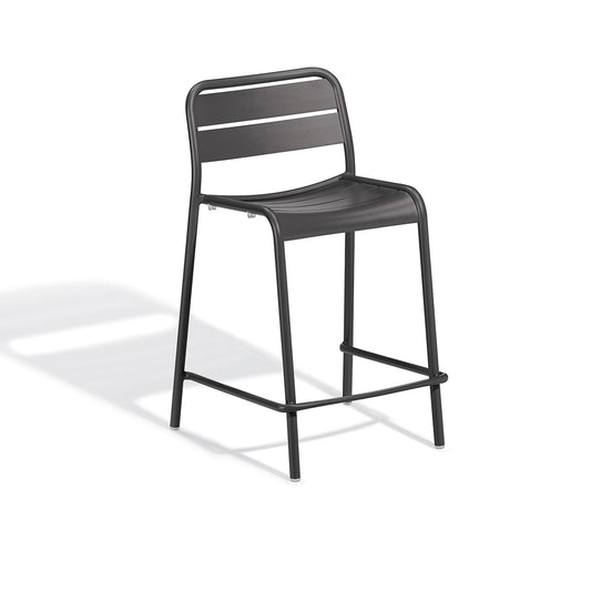 Stacking aluminum counter stool in a dark Carbon powder coat, shown against a plain background