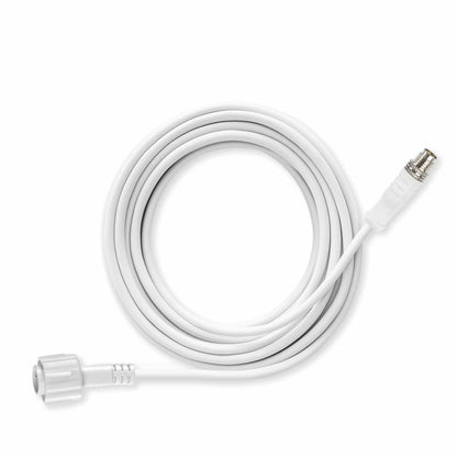 The same coiled white power cable shown from a second angle