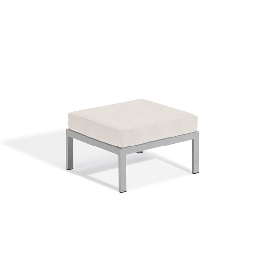 Travira ottoman with a Bliss Linen cushion on a flint powder coated aluminum frame