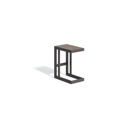 Travira C-table with a Marshland Oak high pressure laminate top on a carbon powder coated aluminum base