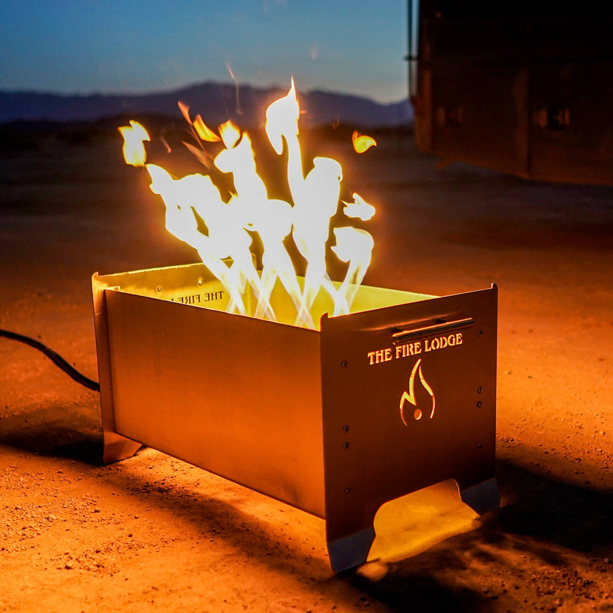 Videl Grills Overlander Burning Grill, in a finished backyard setting