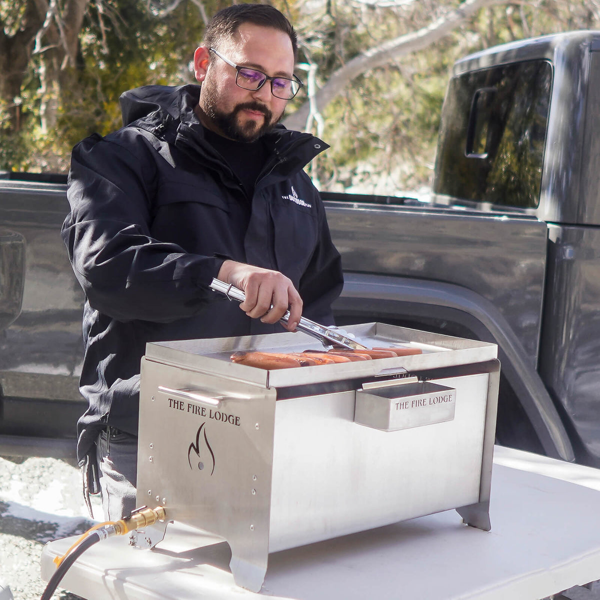 Videl Grills Overlander Burning Grill, shown outdoors in snow