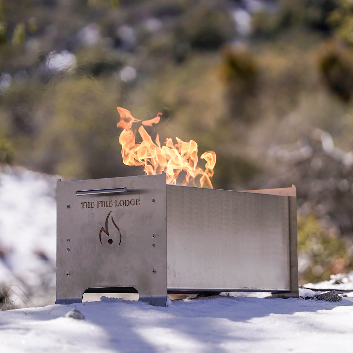 Videl Grills Overlander Burning Grill, shown outdoors in snow