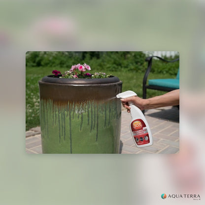 Spraying 303 Multi-Surface Cleaner onto a glazed outdoor planter