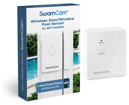 White SwamCam door and window sensor standing beside its retail box on a pale background